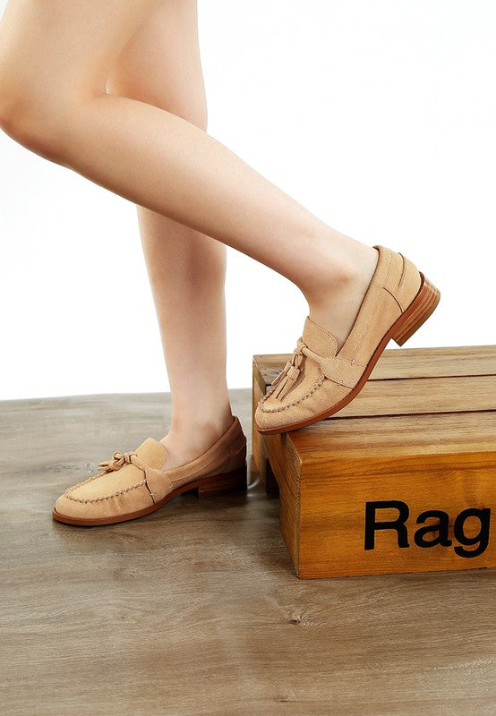 Rag Company genuine leather summer loafers in tan color worn on model standing on wooden box
