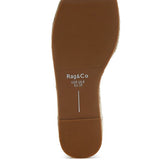Sole view of white slip-on summer sandals by Babe Beachwear showing size and grip details