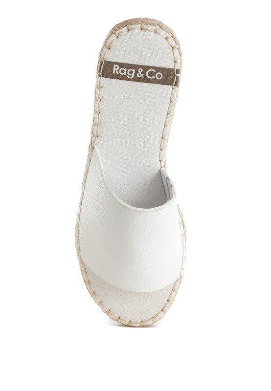 White slip-on summer sandals with stitched sole and open toe design by Babe Beachwear