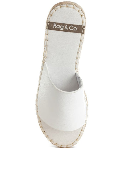 White slip-on summer sandals with stitched sole and open toe design by Babe Beachwear