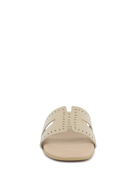 Babe Beachwear women's slip-on beach sandals in beige with perforated design front view