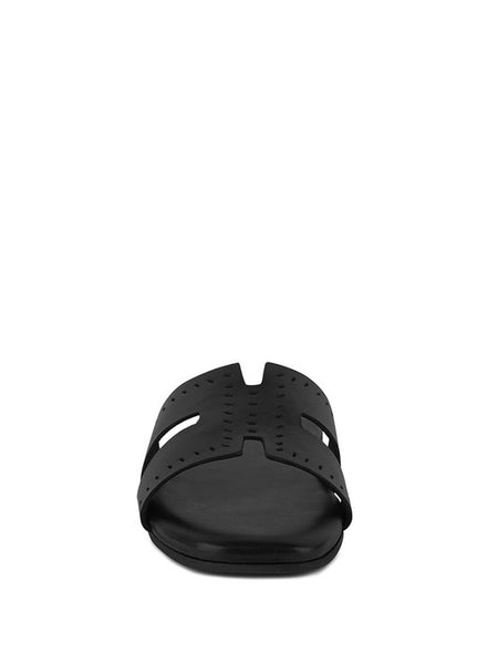 Black women's slip-on beach sandals by Babe Beachwear with perforated upper design
