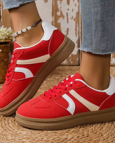 Trendsi red contrast round toe sneakers with white stripes and brown sole worn with jeans