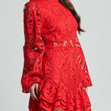 Babe Beachwear red lace mini dress with long sleeves and ruffled hem, not a white lace mini cocktail dress