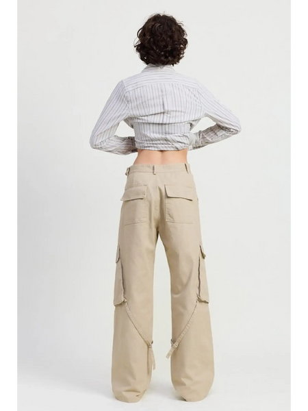 Back view of relaxed cargo pants for women by Emory Park in beige with multiple pockets and loose fit