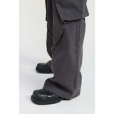Emory Park dark gray relaxed cargo pants for women paired with black shoes showing loose fit and pocket detail