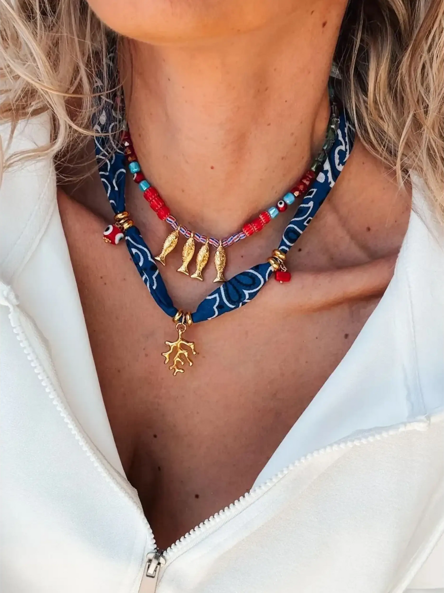 Trendsi resort cruise statement coral necklace with red beads gold fish charms and blue fabric