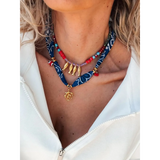 Trendsi resort cruise statement coral necklace with red beads gold fish charms and blue fabric
