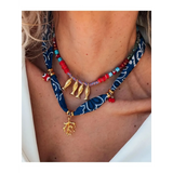 Trendsi resort cruise statement coral necklace with gold fish charms and blue fabric wrap