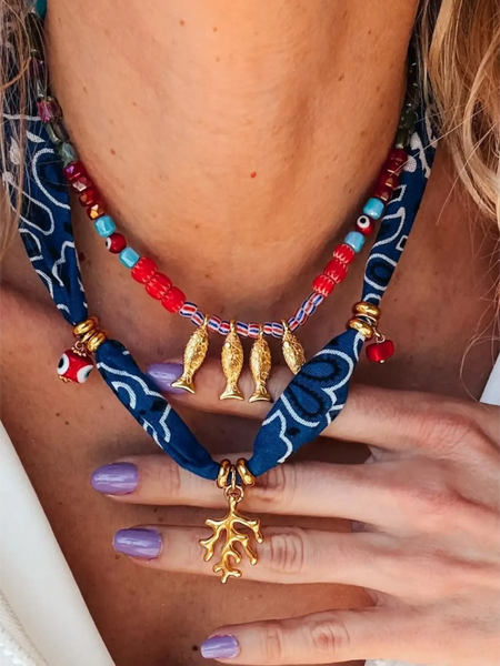 Trendsi resort cruise statement coral necklace with red beads gold fish charms and blue fabric detailing