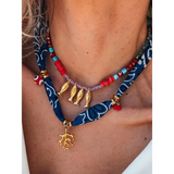 Trendsi resort cruise statement coral necklace with gold fish charms and blue patterned fabric details