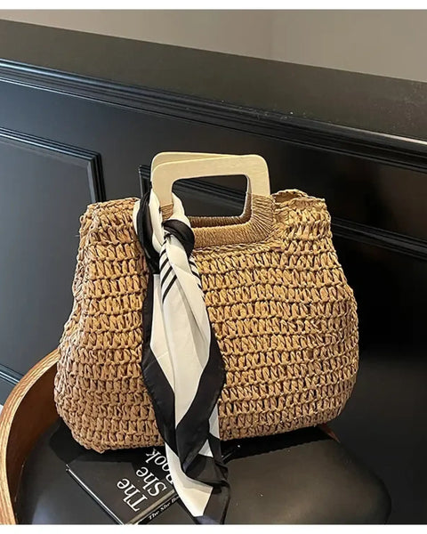 woven straw bag with wooden handles and black white scarf resort wear accessories for women