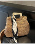 woven straw bag with wooden handles and black white scarf resort wear accessories for women