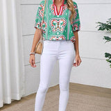 EG fashion resort wear dolman sleeve blouse with green and red print paired with white pants