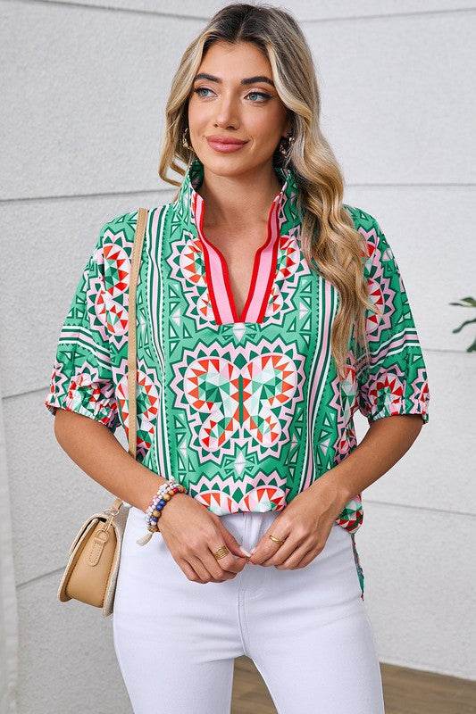 EG fashion resort wear dolman sleeve blouse in green geometric pattern with red accents and half sleeves