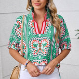 EG fashion resort wear dolman sleeve blouse in green geometric pattern with red accents and half sleeves