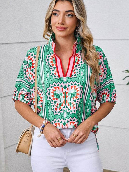 EG fashion resort wear dolman sleeve blouse in green geometric pattern with red accents and half sleeves