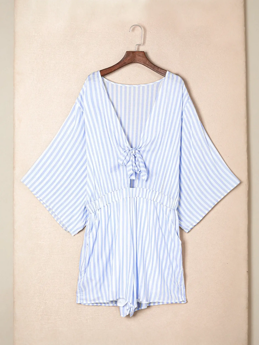 Blue and white striped romper with short sleeves, perfect for summer vibes