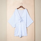 Blue and white striped romper with short sleeves, perfect for summer vibes