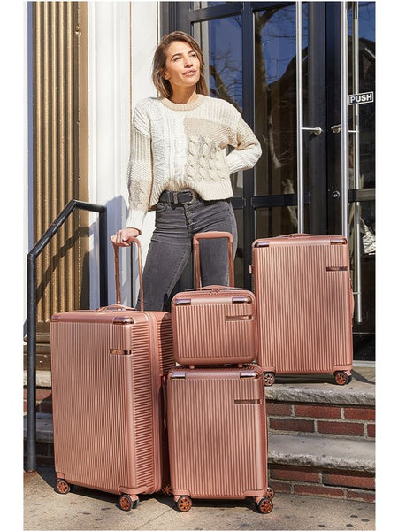 Rose Gold 4 piece travel suitcase set with textured design and spinner wheels by Babe Beachwear