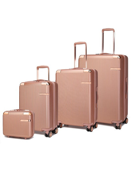 Rose Gold 4 piece travel suitcase set by Babe Beachwear with hard shell and spinner wheels