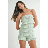 Trendsi light green ruffled tube romper with layered fabric details worn by model