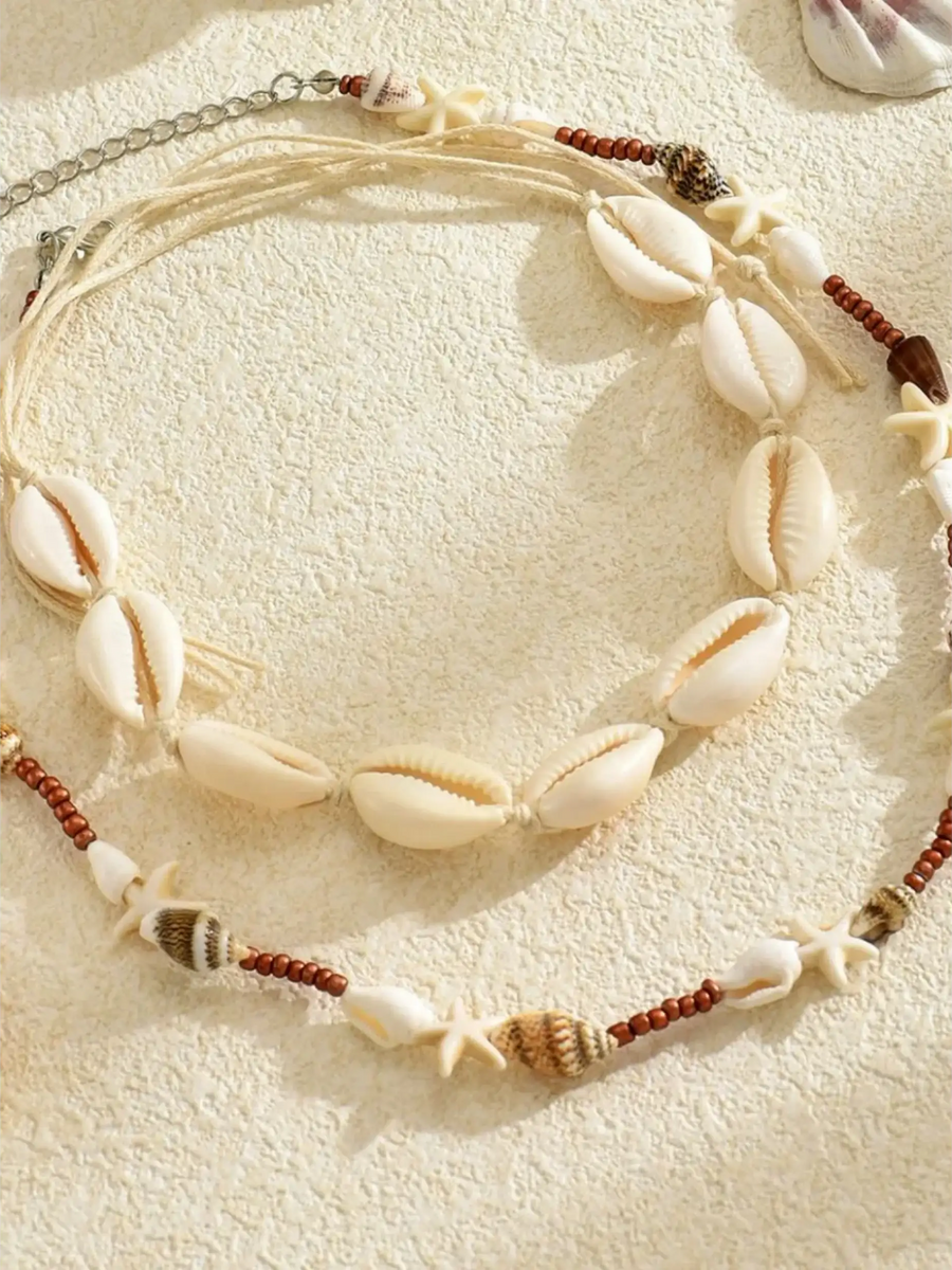 Trendsi seashell layered necklace for beach with natural shells and starfish beads on beige background