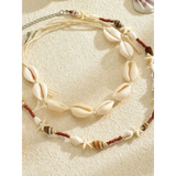 Trendsi seashell layered necklace for beach with natural shells and starfish beads on beige background