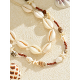 Trendsi seashell layered necklace for beach with natural shells and wooden beads on sand