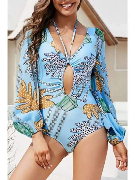Beach Babes sexty cutout long sleeve swimsuit in blue with floral print and front keyhole design
