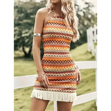 Trendsi Sexy Boho Beach Mini Dress with colorful tribal pattern and fringe hem worn outdoors