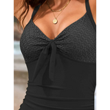 Beach Babes sexy one-piece bathing suit in black with lace detail and front tie knot design