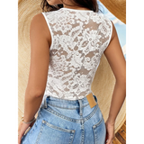 Babe Beachwear white lace sleeveless sexy summer vacation bodysuit paired with blue denim jeans