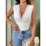 Babe Beachwaer white lace sleeveless sexy summer vacation bodysuit paired with blue jeans