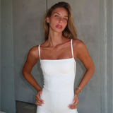 Babe Beachwear sheer sexy athletic romper in white with thin straps and fitted design