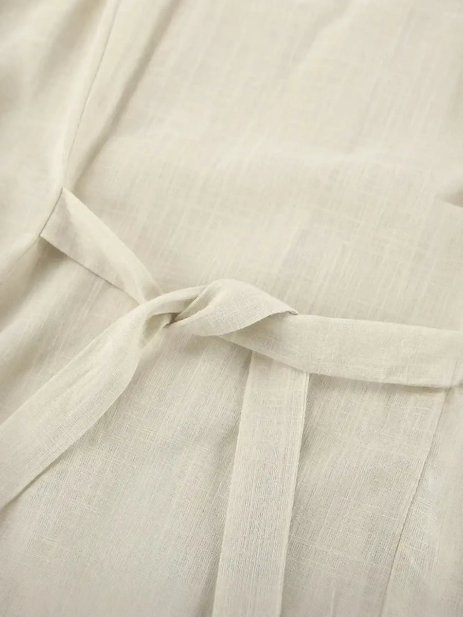Beige fabric tied in a knot, part of khaki lightweight shorts set for effortless style