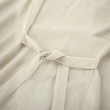Beige fabric tied in a knot, part of khaki lightweight shorts set for effortless style