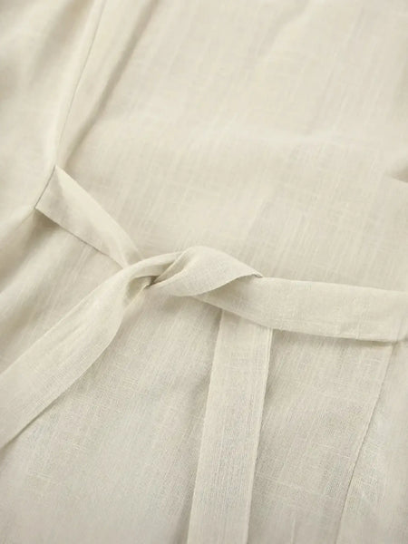 Beige fabric tied in a knot, part of khaki lightweight shorts set for effortless style