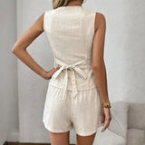 Beige linen vest and khaki lightweight shorts set for effortless style