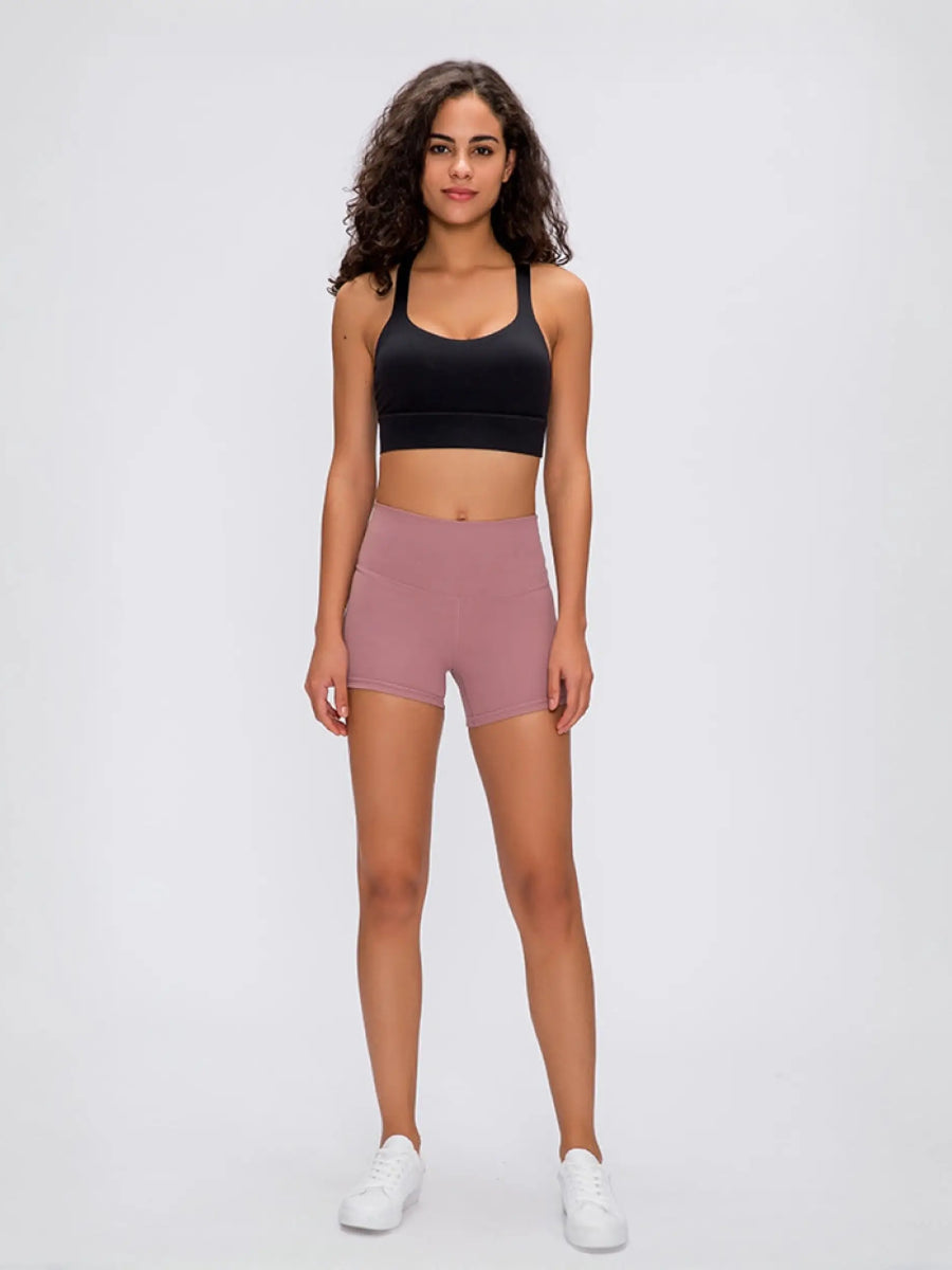 Woman in stylish stitch active shorts ready to crush her workout