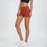Woman in stylish stitch active shorts crushing her workout during exercise