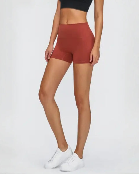 Woman in stylish stitch active shorts crushing her workout during exercise
