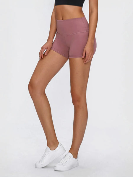 Woman wearing mauve stitch active shorts from Crush Your Workout in Stylish Stitch Active Shorts