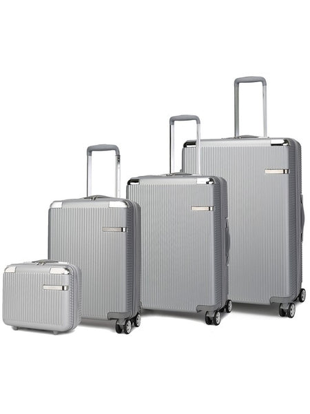 Babe Beachwear Rose Gold 4 piece travel suitcase set with four hard shell spinner luggage pieces