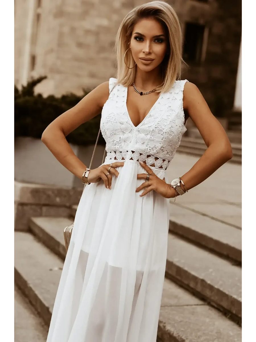 model in white dress front wideSashay in Style: White Lace Maxi Dress with Slit for Resort Wear - Beach Babes Beachwear - Fort Lauderdale