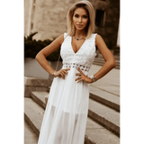 model in white dress front wideSashay in Style: White Lace Maxi Dress with Slit for Resort Wear - Beach Babes Beachwear - Fort Lauderdale