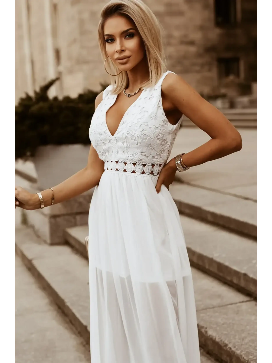 model in white dress side wideSashay in Style: White Lace Maxi Dress with Slit for Resort Wear - Beach Babes Beachwear - Fort Lauderdale