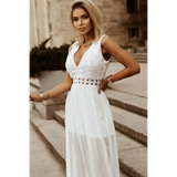 model in white dress side wideSashay in Style: White Lace Maxi Dress with Slit for Resort Wear - Beach Babes Beachwear - Fort Lauderdale
