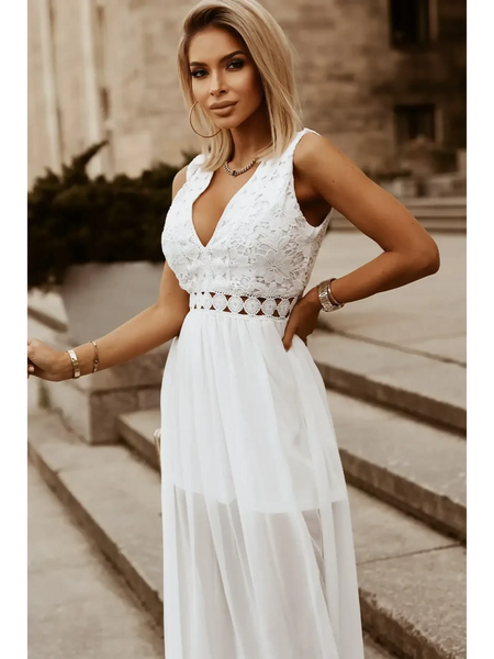 model in white dress side wideSashay in Style: White Lace Maxi Dress with Slit for Resort Wear - Beach Babes Beachwear - Fort Lauderdale