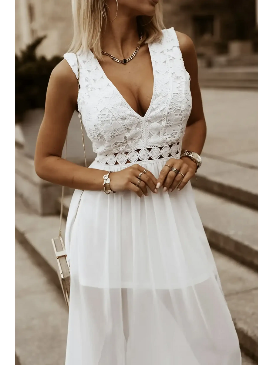 model in white dress front chest Sashay in Style: White Lace Maxi Dress with Slit for Resort Wear - Beach Babes Beachwear - Fort Lauderdale